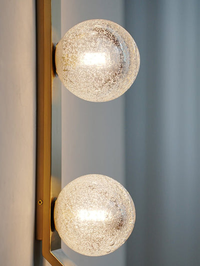 Teriivelle Vertical Orb Wall Sconce