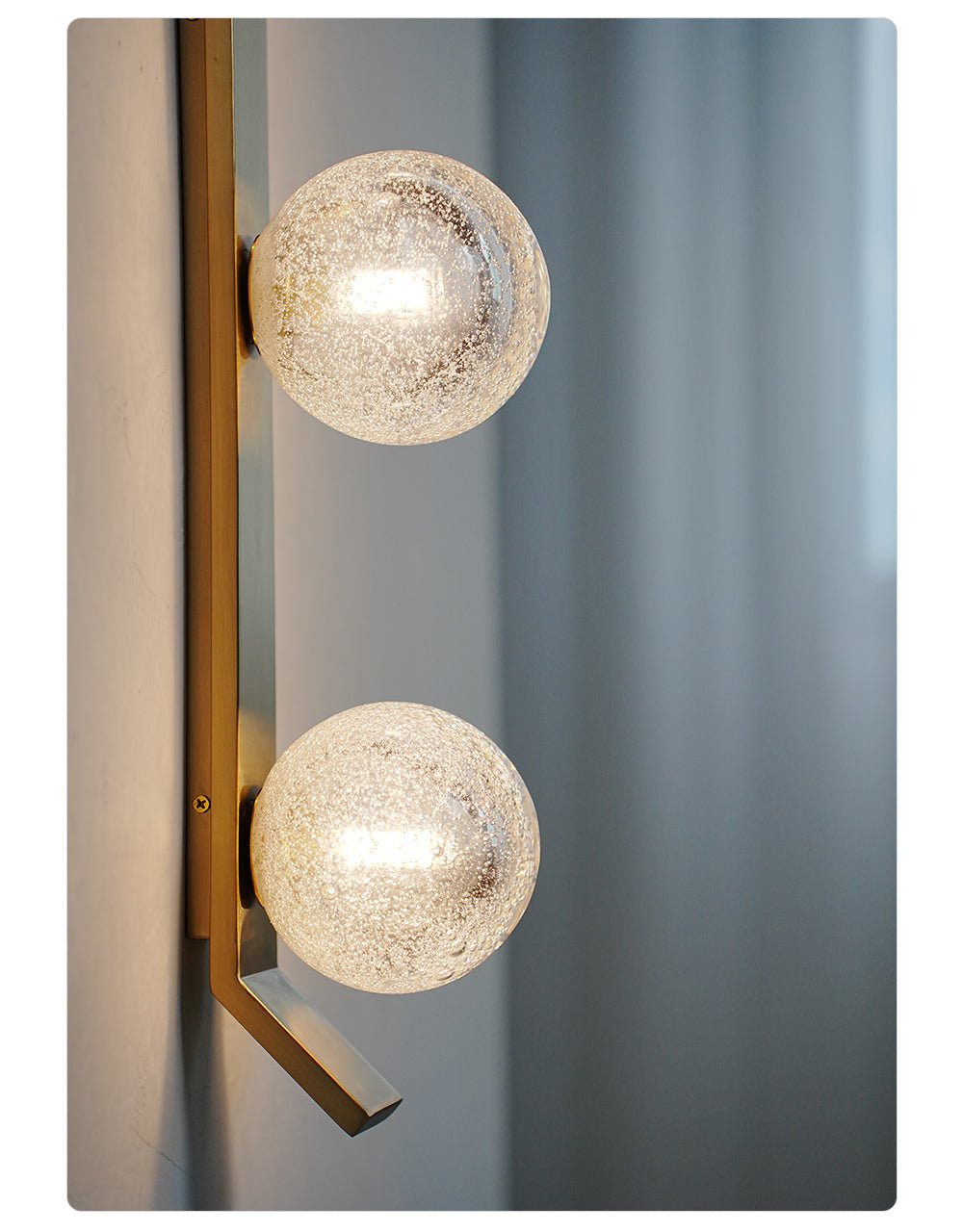 Teriivelle Vertical Orb Wall Sconce