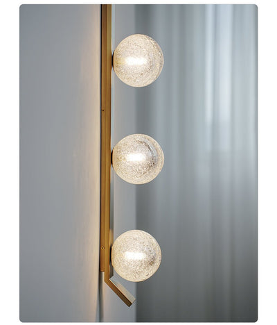 Teriivelle Vertical Orb Wall Sconce