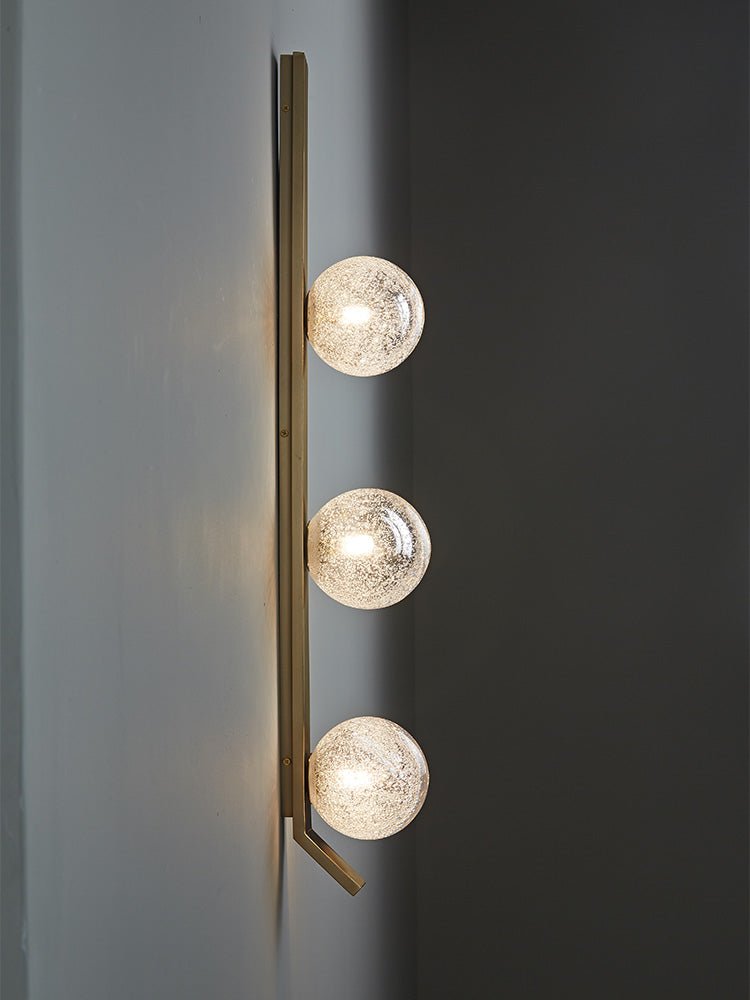 Teriivelle Vertical Orb Wall Sconce