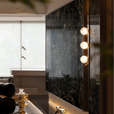 Teriivelle Vertical Orb Wall Sconce