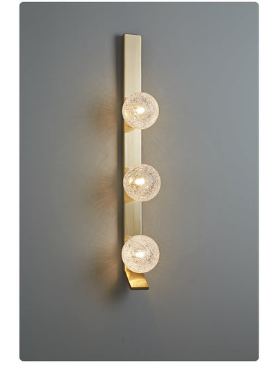 Teriivelle Vertical Orb Wall Sconce
