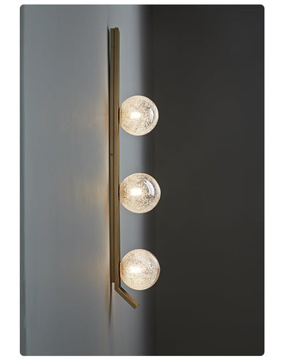 Teriivelle Vertical Orb Wall Sconce