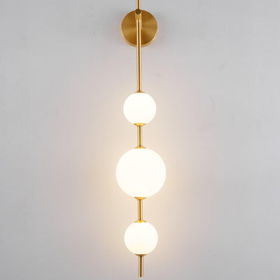 Ilraeia Vertical Globe Plug-in Wall Lamp